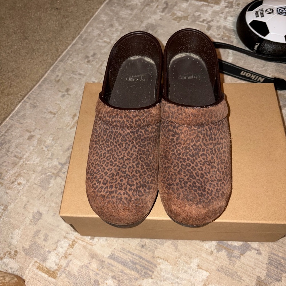 Dansko’s Tan Leopard Pattern Clogs